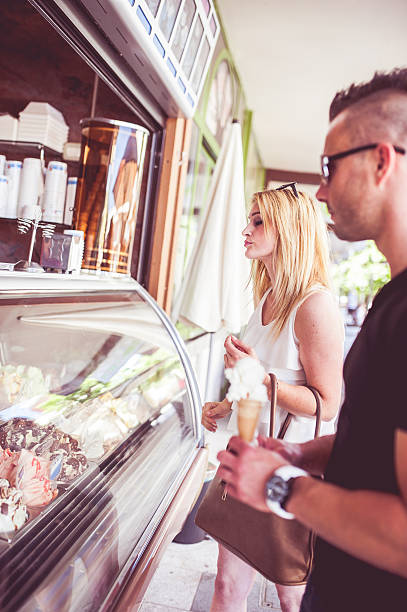 istock Young Couple Buying Ice Cream 594924216