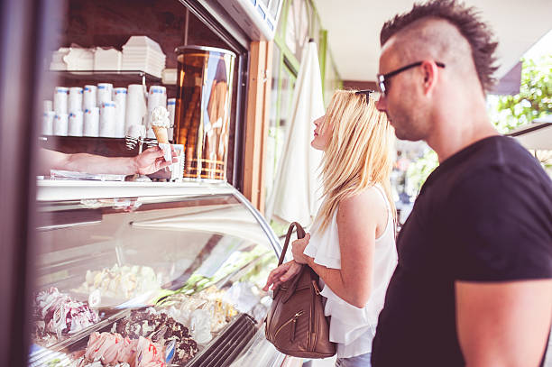 istock Young Couple Buying Ice Cream 594924246
