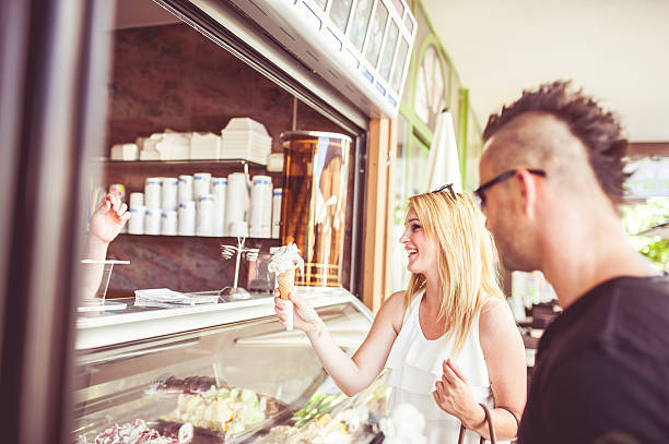 istock Young Couple Buying Ice Cream 594924262