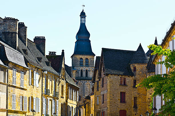 City of Sarlat Black Tiles on the Peaked Roofs in French City of Sarlat sarlat la caneda stock pictures, royalty-free photos & images