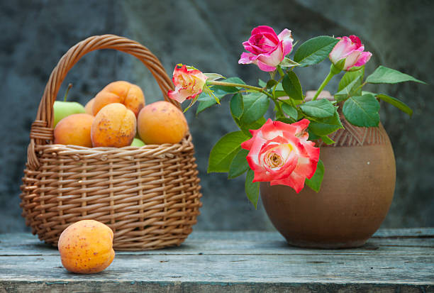 red roses and ripe fruits