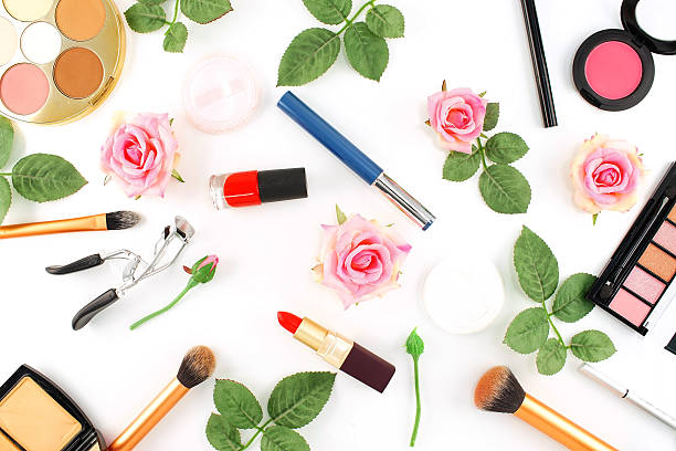 istock Makeup Cosmetics with Vintage Roses on White Background, Flat Lay 594926088