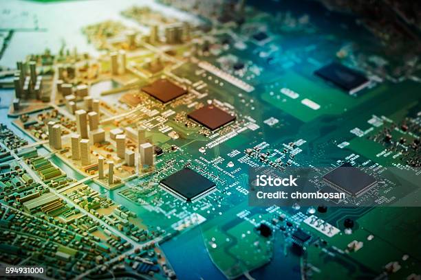 Modern City Diorama And Electric Circuit Board Abstract Image Visual Stock Photo - Download Image Now