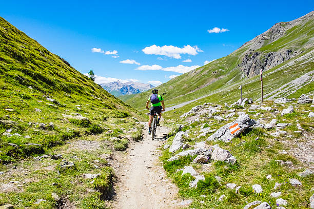 istock Hiker with mountain bike 594932786