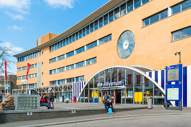 Hilversum, Netherlands - April 10, 2016: People in front of railway station in Hilversum, Netherlands