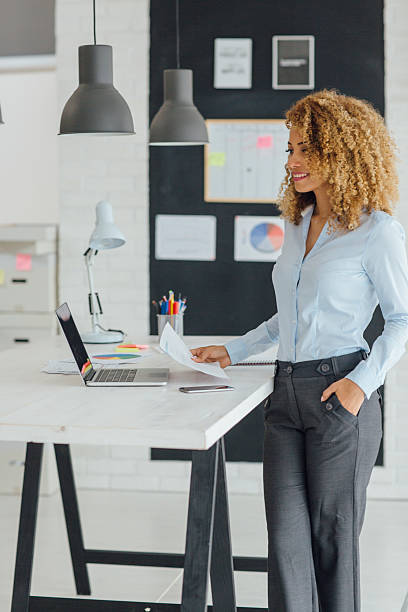 istock Latina Businesswoman Working In Her Office 594935112