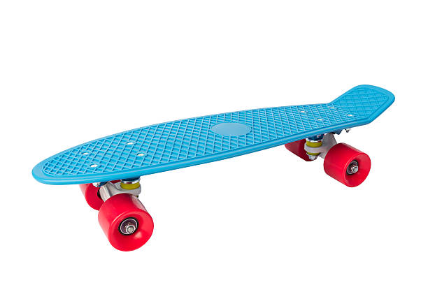 istock Penny Skate board blue with red wheels on white 594935220