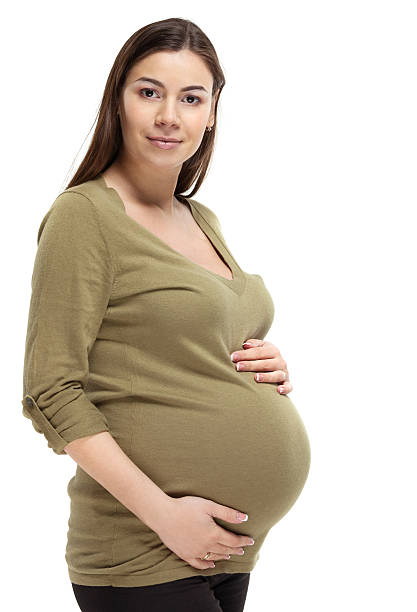 istock Happy young pregnant woman 594936520