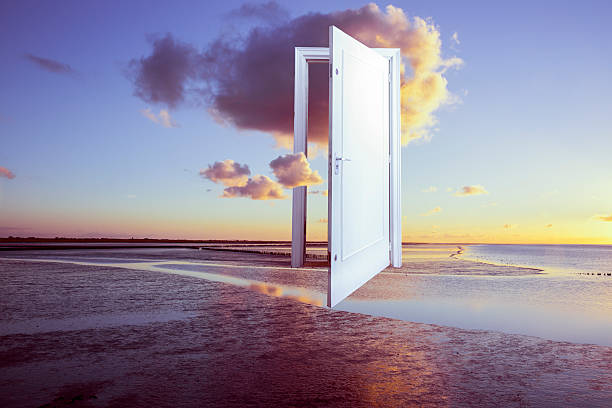 surrealistic door to freedom surrealistic door to freedom emergence photos stock pictures, royalty-free photos & images