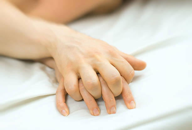 istock Passionate couple making love in bed. 594945606