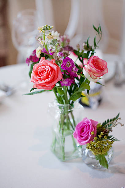 istock Wedding banquet, small restaurant floral, decor in red, informal style. 594946214
