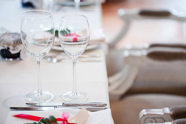 istock Wedding banquet, small restaurant floral, decor in red, informal style. 594946884