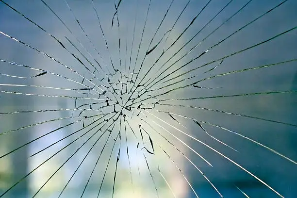 Photo of Broken glass on the window