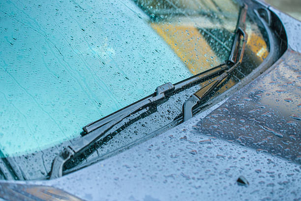 istock Windshield wiper with rain drop in raining season. 594952092
