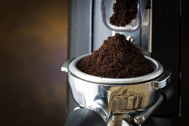 istock coffee grinder grinding freshly roasted coffee powder 594954698