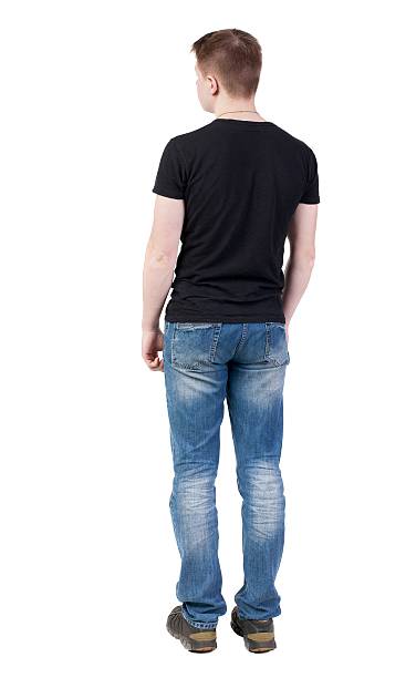 istock Back view of man in jeans. Standing young guy. 595104030