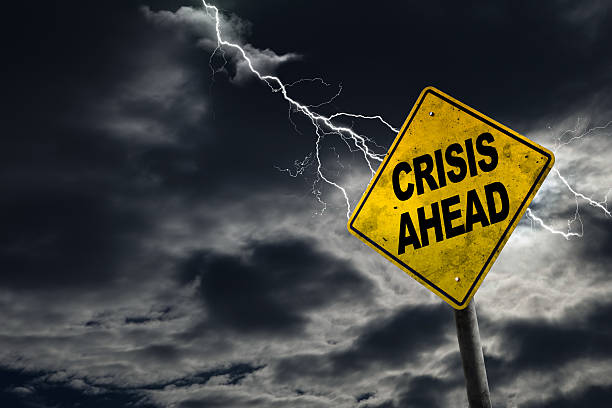 crisis ahead sign with stormy background - kris bildbanksfoton och bilder