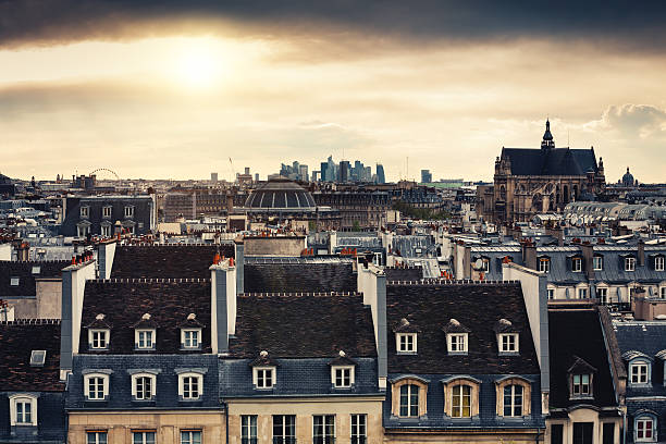 istock Paris Rooftops With La Defense In The Distance 595114866