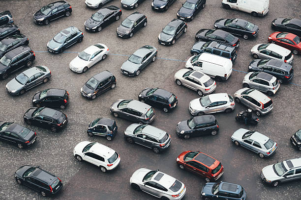 Paris Traffic View from above on a traffic jam as seen from the Arc de Triomphe (Paris, France). place charles de gaulle paris stock pictures, royalty-free photos & images