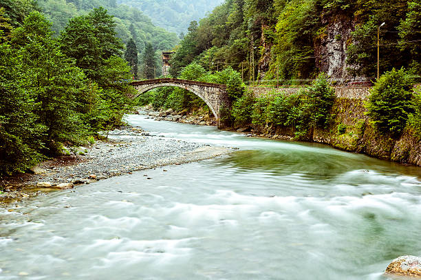 old stone bridge on the river at plateau
