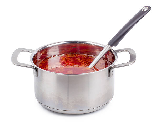 istock Hot borsch in a steel pan isolated 595141918
