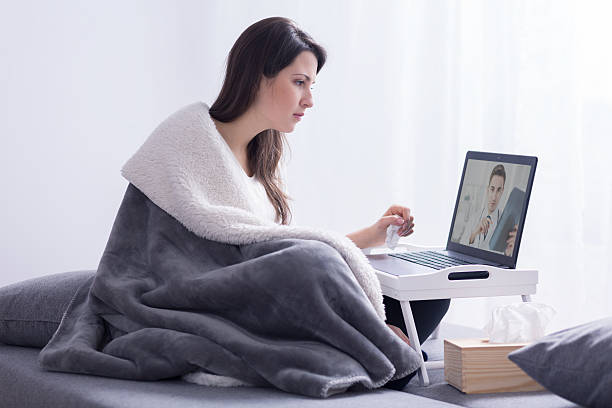 istock Discussing treatment strategy via video chat 595142554