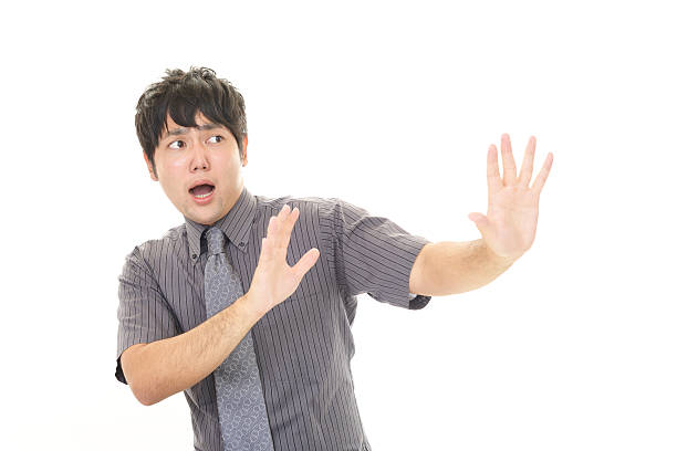 istock Surprised Asian businessman 595147132