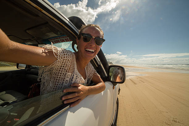 istock Girl takes selfie while driving a 4x4 on Fraser Island 595148236