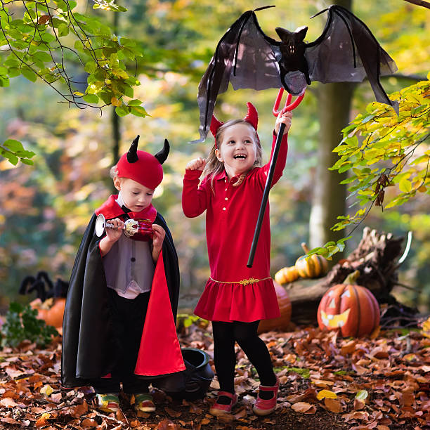 istock Kids on Halloween trick or treat 595153740