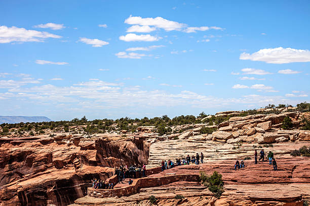 Canyon de Chelly, Arizona. Chinle, AZ, United States - May 4, 2016: Tourists enjoying the view from the rim at Canyon de Chelly National Monument. chinle arizona stock pictures, royalty-free photos & images