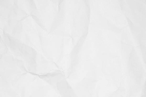 istock Crumpled white paper texture or paper background. 595156542