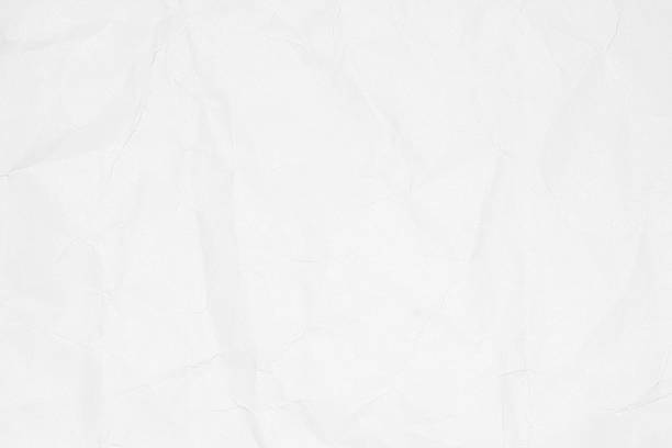 istock Crumpled white paper texture or paper background. 595157946