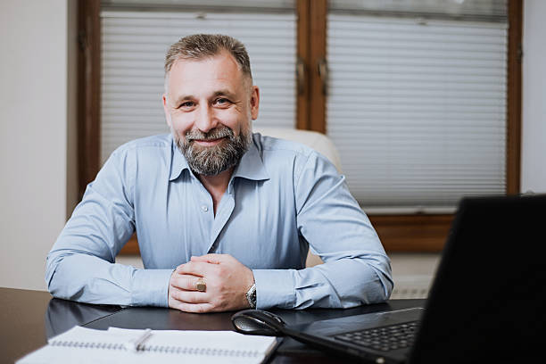 istock Portrait of solid middle-aged businessman. 595158506