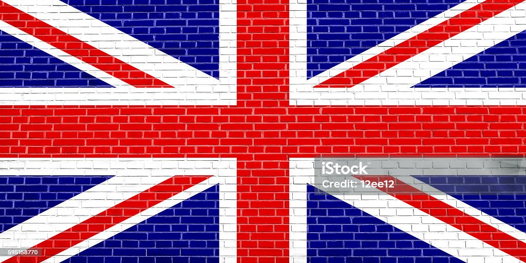 Flag of United Kingdom on brick wall background Flag of the United Kingdom on brick wall texture background. British national flag. Union Jack. Backgrounds Stock Photo