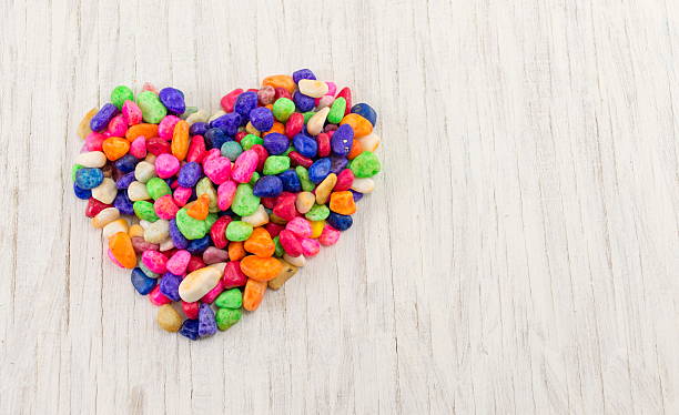 istock Colorful rocks forming a heart shape 595159518