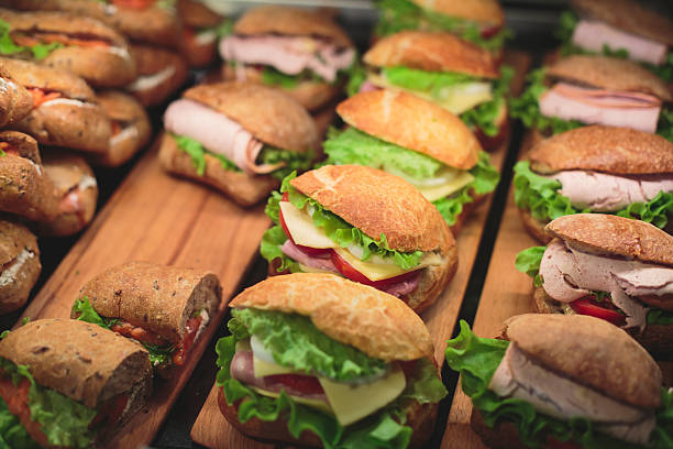istock Beautifully decorated catering banquet table with sandwiches 595159530
