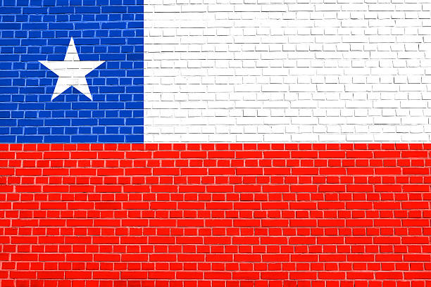 istock Flag of Chile on brick wall texture background 595160126
