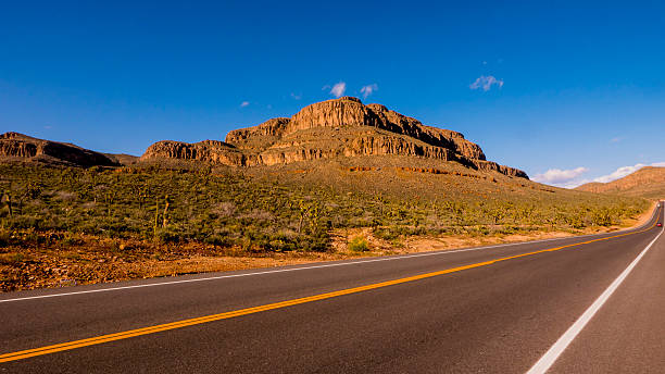 istock Long and empty lonesome road through Arizona 595161734