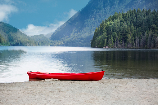 Red Canoe by the Buntzen lake located in British Columbia, Canad.Stock Image