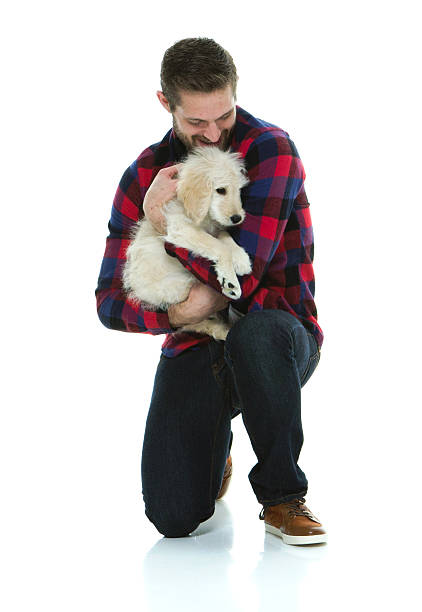 istock Male embracing dog 595319746