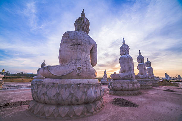 istock many Buddha statues on the field 595321584