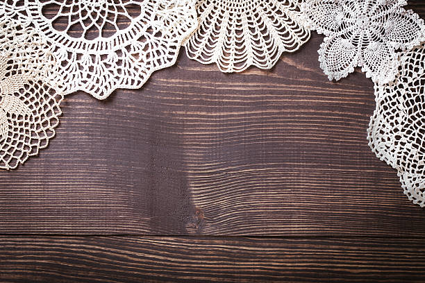 istock Vintage background with white crochet lace 595322146