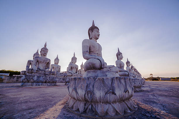 istock many Buddha statues on the field 595323178