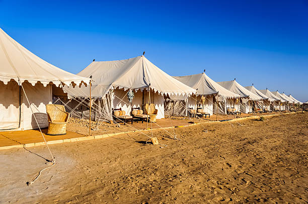 istock White tents inIndian Thar desert, copy space 595323516