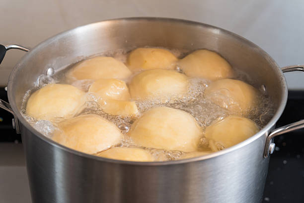 istock cooking apple soup with stainless steel pot 595325246