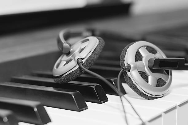 istock Headphones on piano keyboard 595326206
