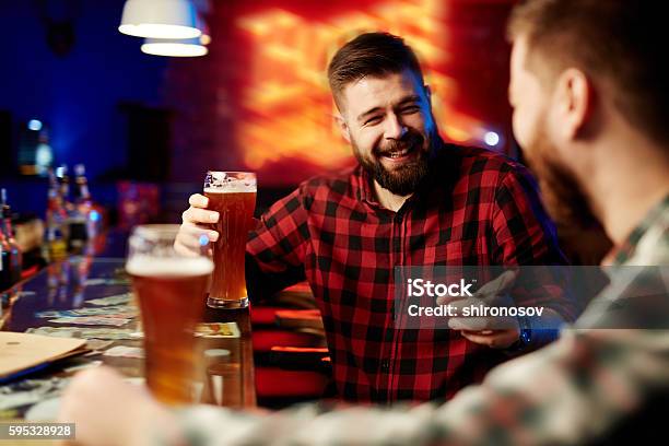 Drinking Beer At Bar Stock Photo - Download Image Now - Drinking, Bar - Drink Establishment, Bar Counter