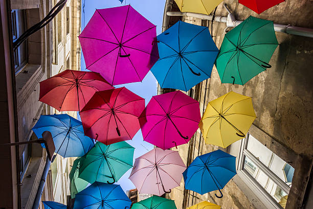 istock Street decorated with colored umbrellas 595329572
