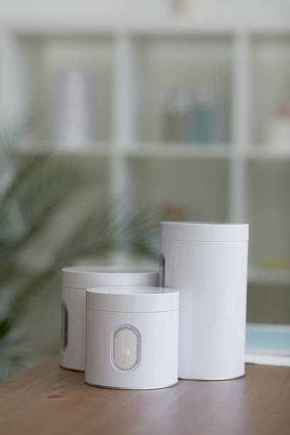 istock White cans on table in medical office 595329784