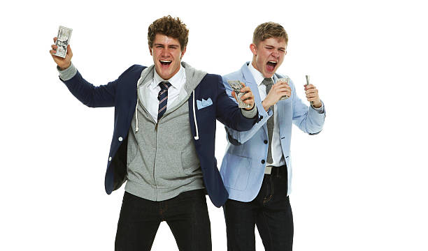 istock Brothers excited by money 595333186